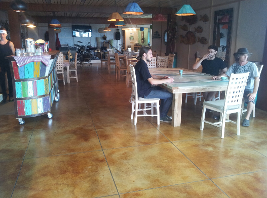 chemical stain for concrete floor nz grinders tauranga lounge floor cafe retail concrete floor with brown chemical stain NZ Grinders Tauranga