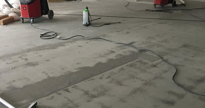 Concrete grinding a floor