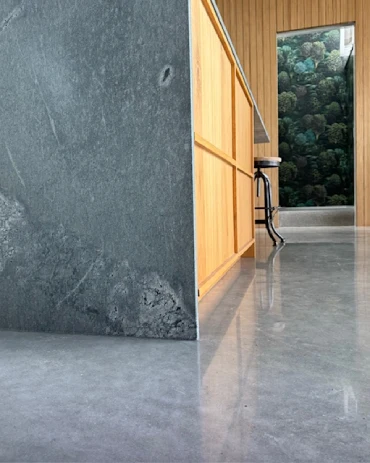 The Evolution of Polished Concrete Floors: From Industrial Origins to Residential Luxury